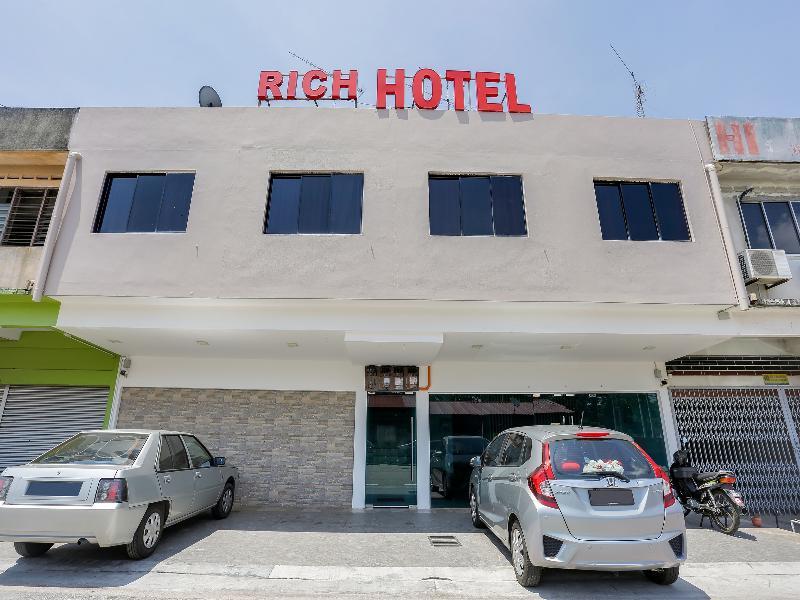 Super Oyo 89495 Rich Hotel Air Hitam Buitenkant foto